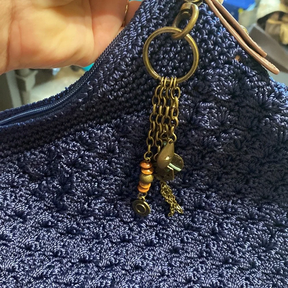 The Sak Navy Crochet Shoulder Bag with Brown Leather Straps